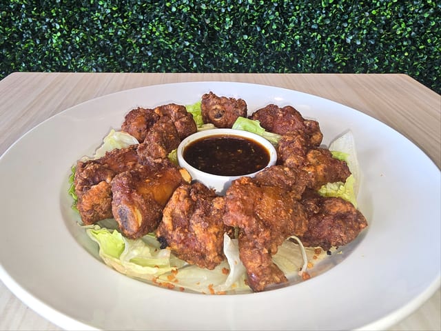 ** NEW Crispy Pork Ribs **.
